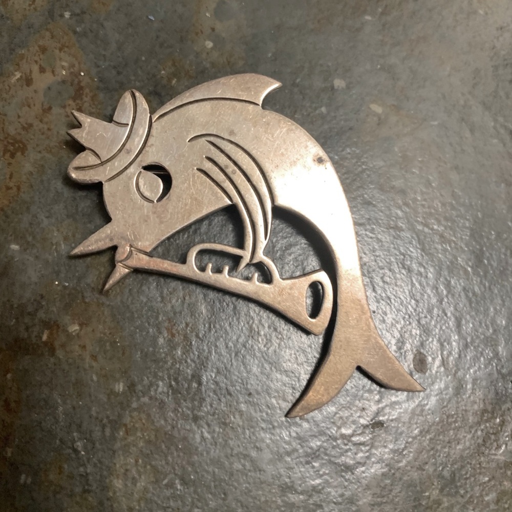 Dolphin 🐬 playing a horn pin✨